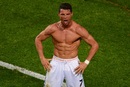 Cristiano Ronaldo shows off his physique as he celebrates scoring