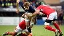 Scotland lock Jonny Gray tries to get through the Tonga defence