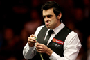 Ronnie O'Sullivan looks on during his first round match against Ricky Walden