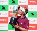Luke Donald shares a moment with his trophy