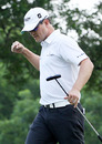Zach Johnson celebrates after setting the course record