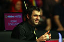 Ronnie O'Sullivan reacts to the crowd after breaking Stephen Hendry's all-time centuries record