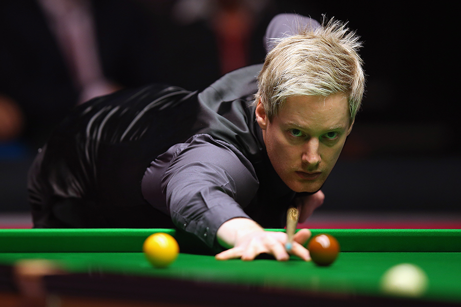 Neil Robertson in action against Shaun Murphy during the final of the Masters