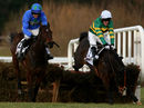 Jezki (right) blunders at the last allowing Hurricane Fly victory in the Irish Champion Hurdle
