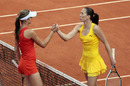 Jelena Jankovic (R) shakes hands with Slovakia's Daniela Hantuchova 