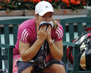 Justine Henin ponders her options after crashing out at Roland Garros