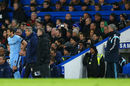 Jose Mourinho watches as Frank Lampard prepares to come on against his old club