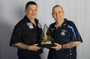 Gary Anderson and Phil Taylor pose with the Premier League trophy ahead of opening night