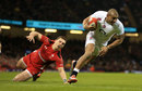Jonathan Joseph bursts over the line to score for England