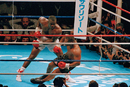Buster Douglas follows with a left, dropping Mike Tyson to the canvas in the 10th round