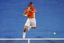 Rafael Nadal climbs into a forehand against Philipp Kohlschreiber, Australian Open