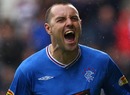 Kris Boyd celebrates in front of the Rangers fans