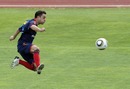 Xavi executes a volley during a Spain training session