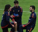 Carles Puyol jokes with Gerard Pique and Cesc Fabregas