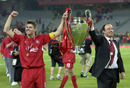 Liverpool captain Steven Gerrard and Rafael Benitez celebrate with the trophy