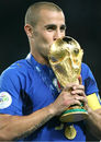 Fabio Cannavaro kisses the Jules Rimet Trophy