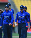 Eoin Morgan leads the England team off after a heavy defeat