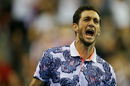 James Ward came from two sets down to beat John Isner and give Great Britain a 2-0 lead against the United States