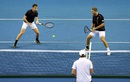 Jamie Murray and Dominic Inglot return the ball to the Bryan Brothers