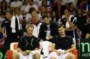 Andy Murray consoles brother Jamie and Dominic Inglot