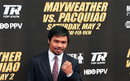 Manny Pacquiao arrives for the press conference