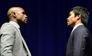 Floyd Mayweather and Manny Pacquiao face off