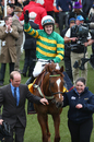 AP McCoy on Uxizandre celebrates after victory in the Steeplechase