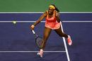 Serena Williams stretches for a backhand