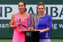 Jelena Jankovic and Simona Halep pose with their trophies