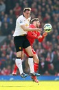 Phil Jones clatters into Adam Lallana as he challenges for the ball