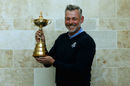 Darren Clarke poses for the media with the Ryder Cup