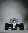 Lewis Hamilton took pole in a stormy Malaysia qualifying