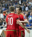 Gareth Bale celebrates a goal with team-mate Aaron Ramsey
