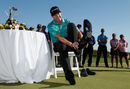 Local hero Jimmy Walker pulls on his cowboy boots after winning the Texas Open