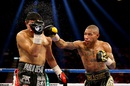 Ashley Theophane throws a right at Pablo Cesar Cano