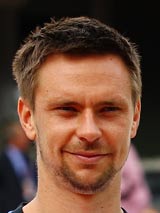 Robin Soderling wipes his face