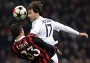 Ruud van Nistelrooy challenges Thiago Silva for the ball