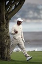 Tiger Woods punches the air