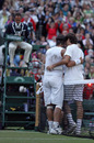Roger Federer congratulates Rafael Nadal