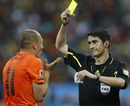 Arjen Robben receives a yellow card