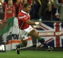 Jason Robinson scores the first try