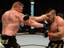 Brock Lesnar lands a right hand on Heath Herring
