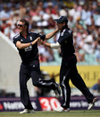 Graeme Swann is congratulated by Andrew Strauss after he removed Shane Watson